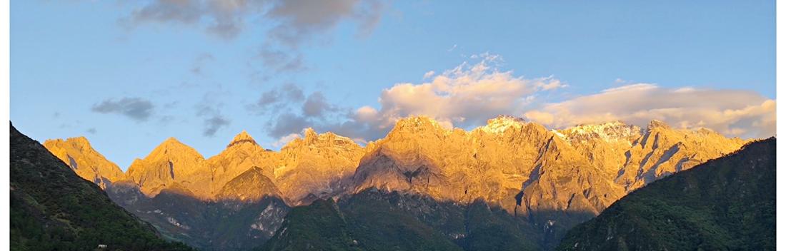 The Jade Dragon range lit gold by the low sun
